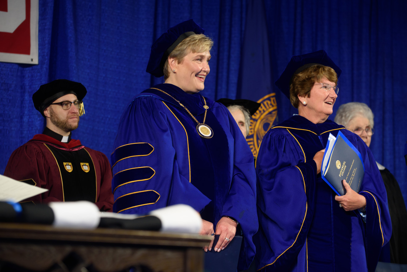 president beth ross and board chair margaret mckenna on stage