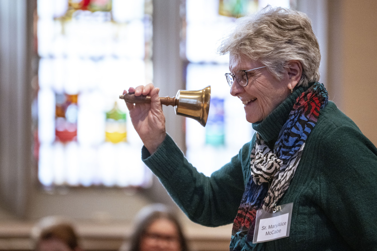 Woman ringing bell